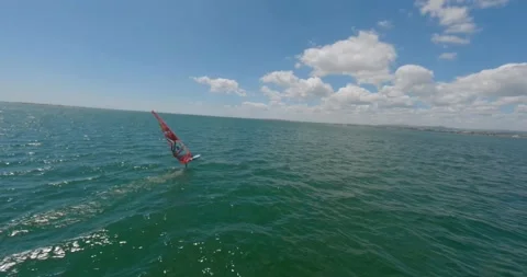 FPV Drone view of Wind Surfer at Ria Formosa Wetlands in Algarve, (F) Stock Footage 201273820