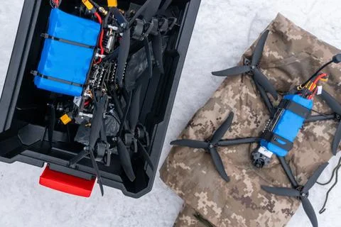 FPV drones stored in a box in snow Stock Photos