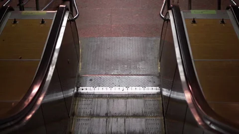  FPV escalator moves down to the subway platform Video stock 195818170