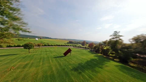 FPV fast flight racing drone footage of fascinating white building near Stock-Footage 183447260