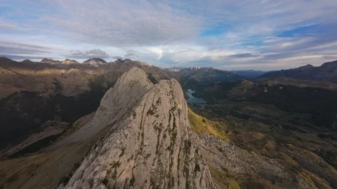 FPV flight beside a jagged limestone ridge Stock Footage 346003745