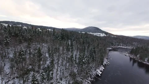 Fpv flight between tall snowy rock walls Stock Footage 321178394