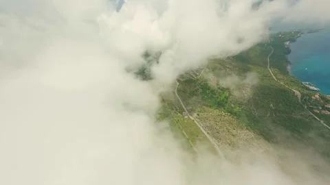 FPV flight in the clouds on Christ the Redeemer at Maratea. Stock Footage 246748752