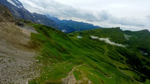 FPV Flight diving down west flank of the EIGER Switzerland Grindelwald Video stock 293741290