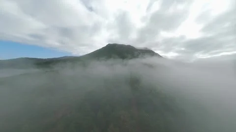 FPV flight over a misty mountain forest in the Pyrenees Stock Footage 346000284