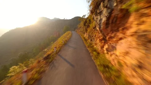 FPV Flight Over Mountain Road On The Ha Giang Loop At Sunset, North Vietnam Stock Footage 262949656