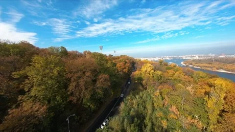 FPV flight over the public park on the embankment of Kiev in the autumn. Stock-Footage 168884495