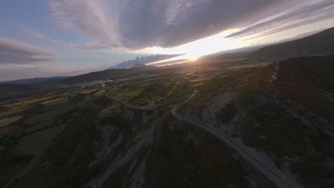 FPV flight over a Pyrenees valley with small villages Stock Footage 346000360