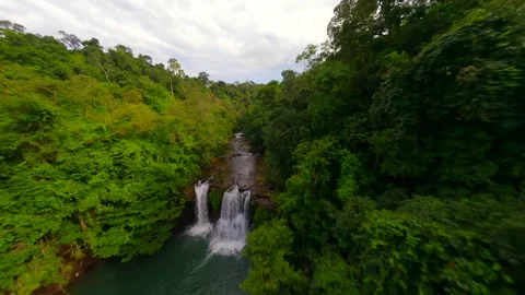 FPV flight over river and waterfalls in the lush jungle in Thailand Stock Footage 254148268