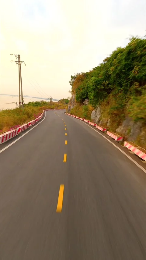 FPV Flight Over Scenic Cliff Road on Cat Ba Island Vietnam 스톡 동영상 266766367