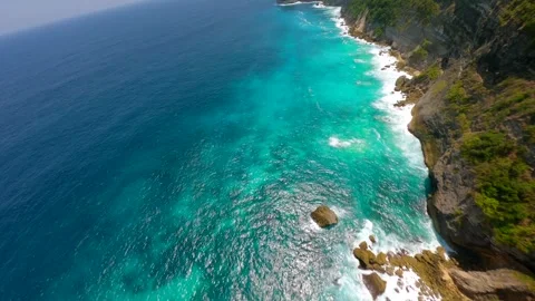 FPV flight over scenic cliffs and ocean waters on Nusa Penida, Bali, Indonesia Stock Footage 306517562
