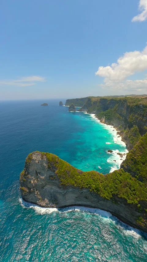 FPV flight over stunning cliffs and ocean waters on Nusa Penida, Bali, Indonesia Stock Footage 287983372