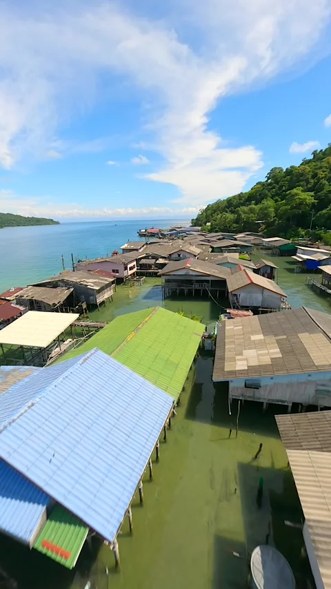 FPV flight over traditional floating fishing village in Koh Kood island Thailand Stock Footage 278632374