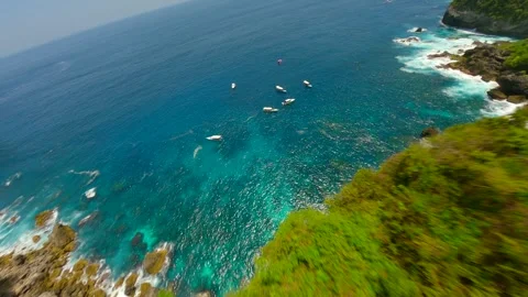 FPV flight over turquoise ocean waters at Manta Point on Nusa Penida, Bali Stock Footage 288489115