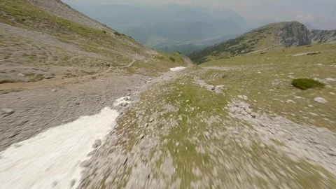 FPV Flight Through Rocky Mountain Ridge (4K) Stock Footage 311547213