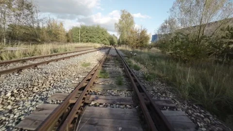 FPV Flying Over Abandoned Train Tracks Stock Footage 289040350