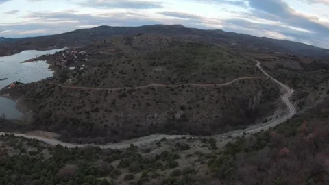FPV Freestyle Drone Dive and Drive Along Scenic Road, Macedonia Video stock 330514267