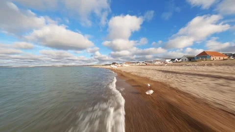 FPV, Klitmoller Smooth Waves On Magical Sandy Beach Stock Footage 252671657