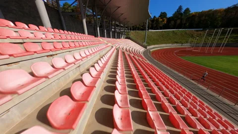 FPV maneuverable flight over large contemporary stadium in bright sunny day Stock Footage 167926257