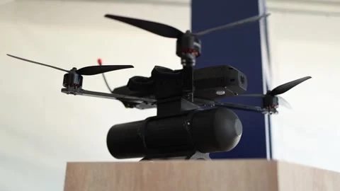 FPV military drone equipped with combat munition designed for aerial payload dro Stock Footage 346451462