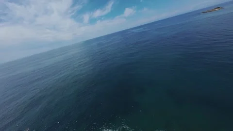 FPV Multi-Angle Flyby of Tour Boat on Open Sea Stock Footage 309039413