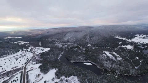 Fpv pass above icy river curves Stock Footage 321178833