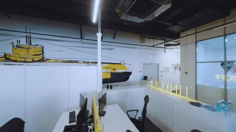 FPV shooting of the company's office, programmers work in the office Video stock 239484183