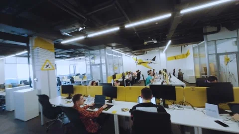 FPV shooting of the company's office, programmers work in the office Video stock 239484515