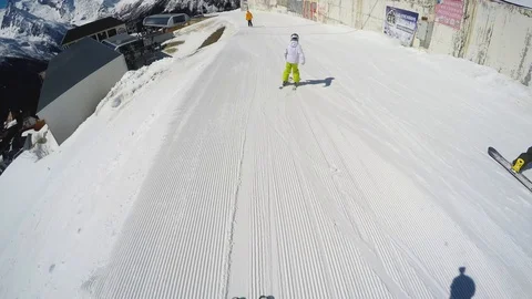 FPV Skier slopes down hill. Good weather for skiing. Action camera is on helmet Stock Footage 109199349