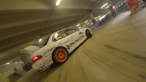 FPV Solo Drift: Low-Angle Subaru in Motion Stock Footage 327036101