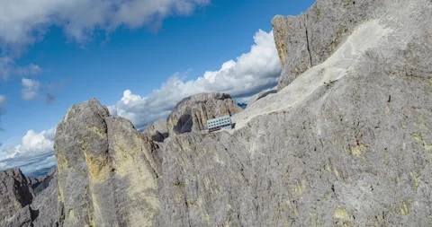FPV style hyperlapse on mountain peak in Dolomites, Italy. Aerial backward Stock Footage 333839196