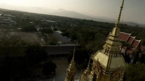 FPV Sunset Top Shot of Wat Khaemaed  Chiang Mai Stock Footage 332794787