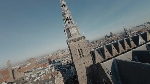 FPV Through Amsterdam Streets Approaching Cathedral - Central Stock Footage 313832294