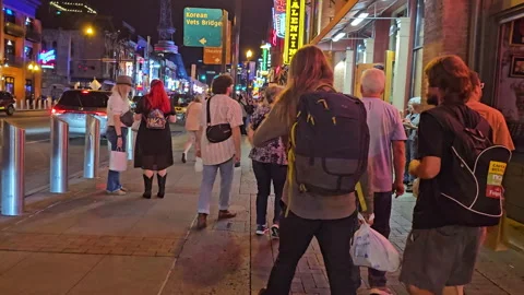 FPV-Walking Broadway-Night-Crowds-Nashville Stock Footage 287959851
