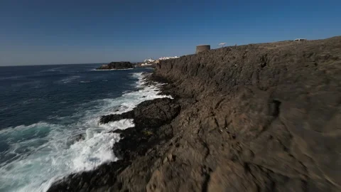 Fpv waves coast run bird flying El Cotillo Fuerteventura drone aerial Stock Footage 223581739