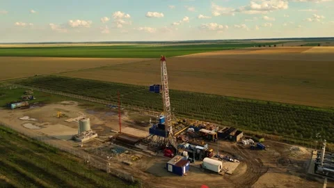 Fracking drilling for shale gas in a field Stock Footage 281239534
