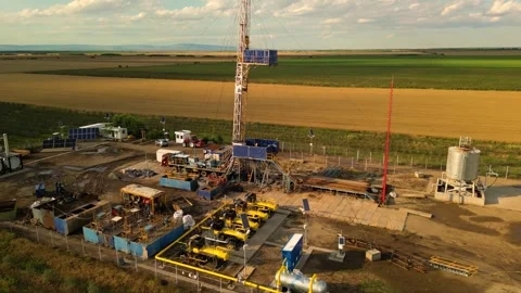 Fracking drilling for shale gas in a field Stock Footage 281239753