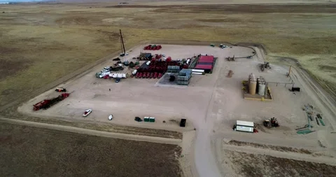 Fracking pad approach and fly over 2021.  4K drone DCI footage. Stock Footage 167396462