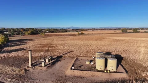 Fracking pad in the middle of agricultural fields in Colorado. Stock Footage 255603248