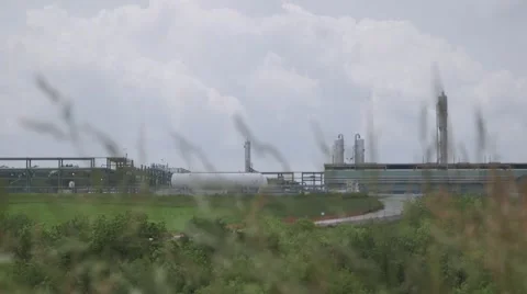 Fracking Plant through grass Stock Footage 51023887