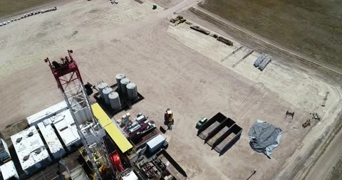 Fracking tower flyover with a gimal downshot and tilt. Drone 4K 60fps Stock Footage 167931360