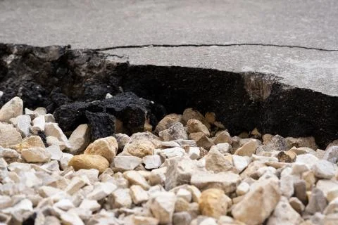 Fracture asphalt close-up, inside rubble, texture Stock Photos