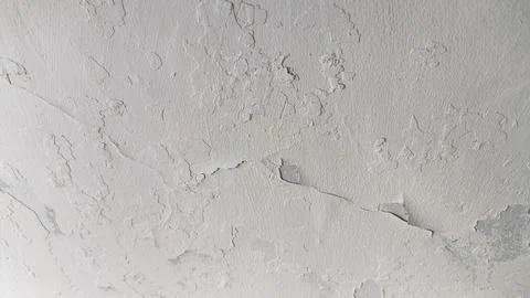 Fractured cement wall texture with horizontal orientation showing damaged c.. Stock Photos