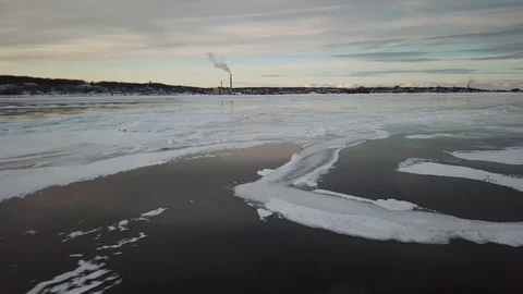 Fractured ice sheet in bay Stock Footage 100134934