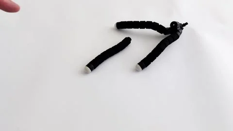 Fractured Support: The Quiet Drama of a Falling Tripod Stock Footage 315739408