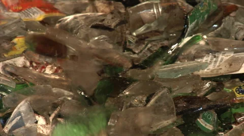 Fractures of waste glass falling into a container - closeup. Stock-Footage 61526695