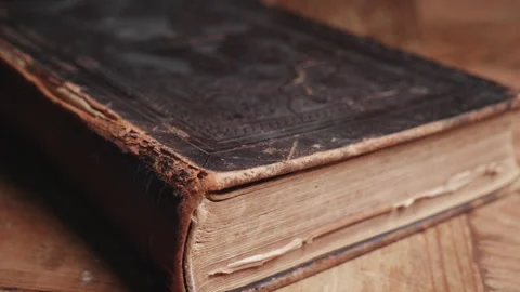 Fragile binding of an antique Bible Stock Footage 290013901