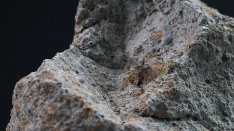 Fragile meteorite stone from outer space in macro rotating view Video stock 155955382