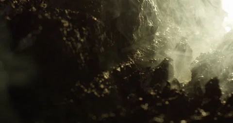 A fragile meteorite stone from space begins to smoke Stock Footage 190830843