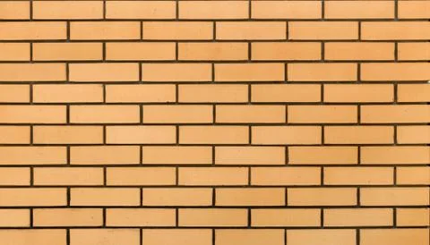 Fragment of a brick wall. Stock Photos